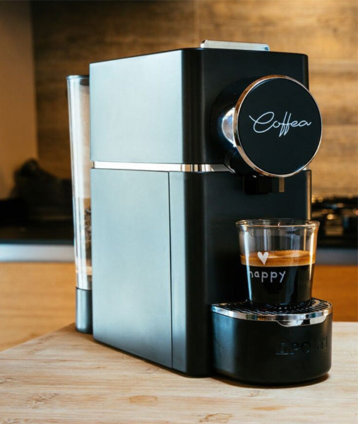 L'immagine mostra la macchina del caffe in cialde Ese di nome Coffea by Polti